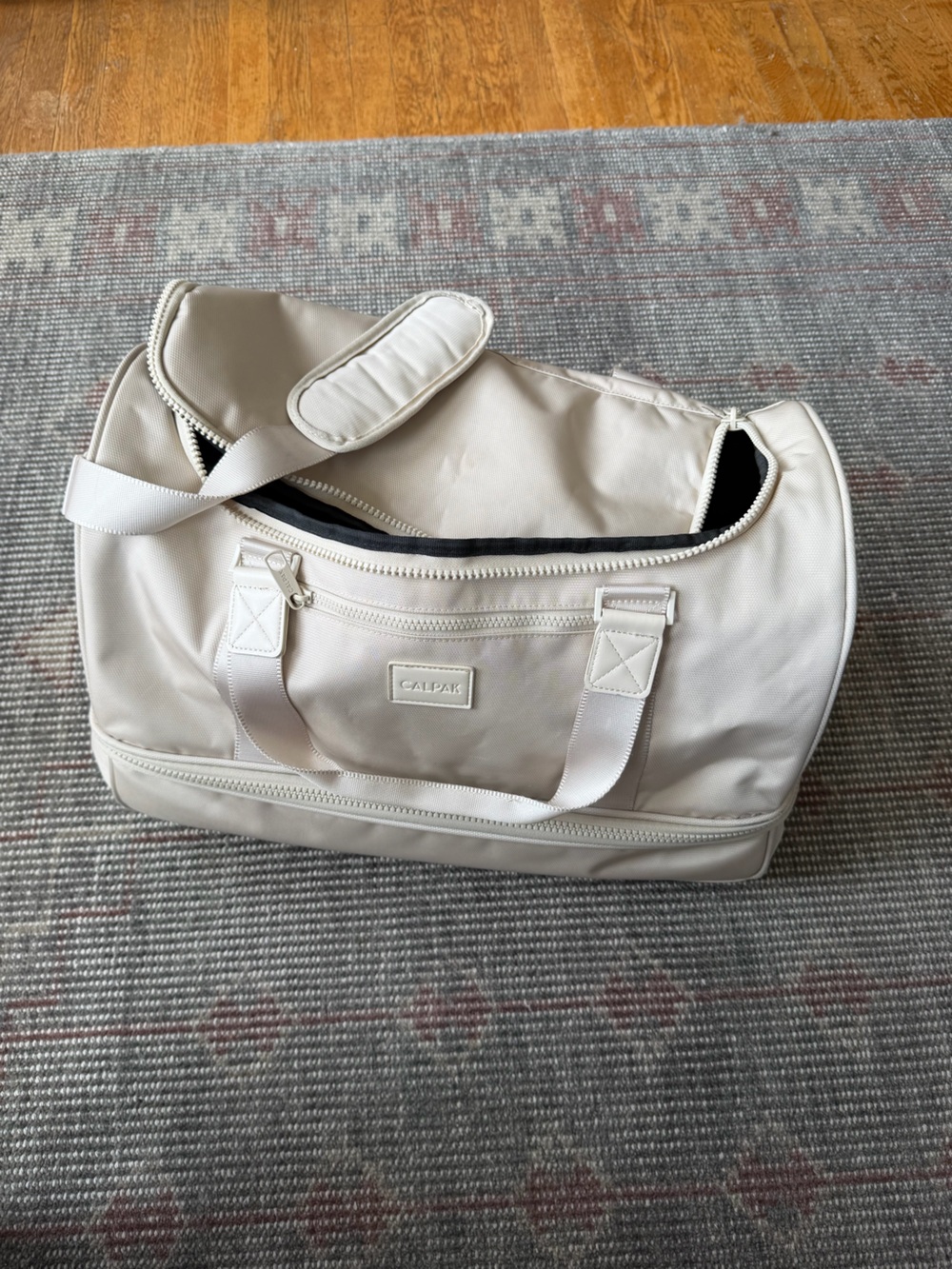 Calpak Stevyn Duffel Bag with shoe compartment in Dune